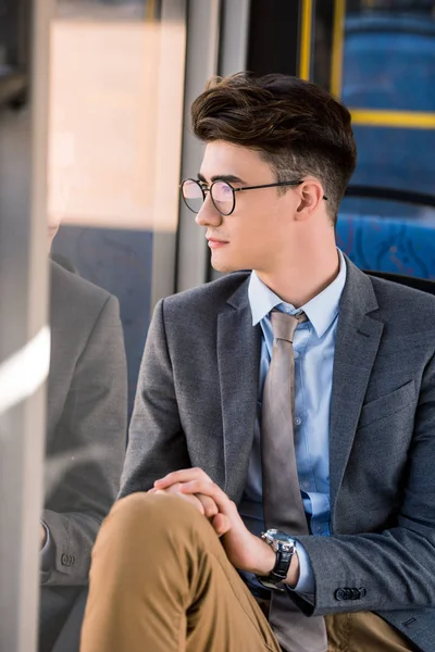 Young businessman in bus — Stock Photo, Image