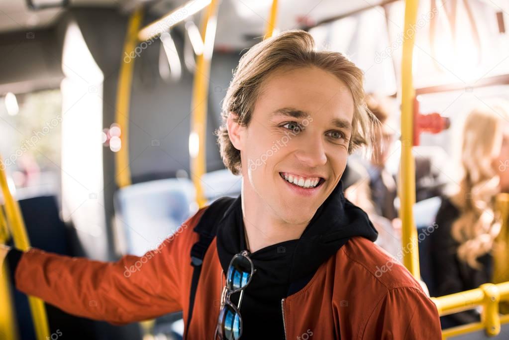 young man in bus