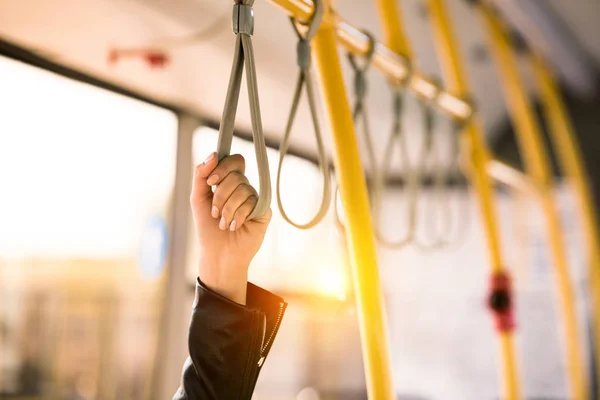 Person standing in bus — Stock Photo, Image