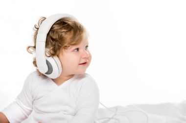 smiling toddler in headphones clipart
