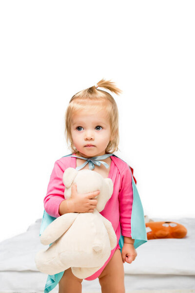 toddler girl with teddy bear