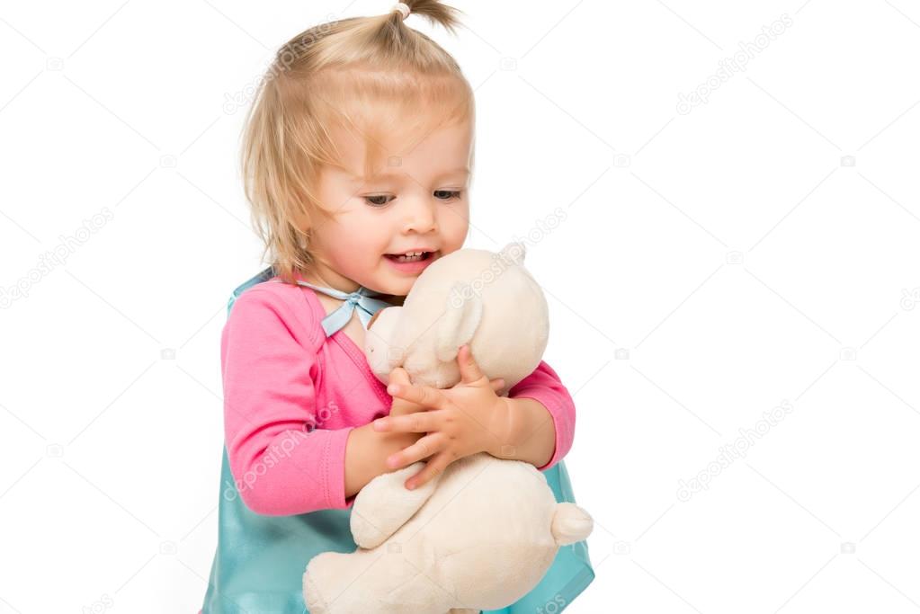 toddler girl with teddy bear