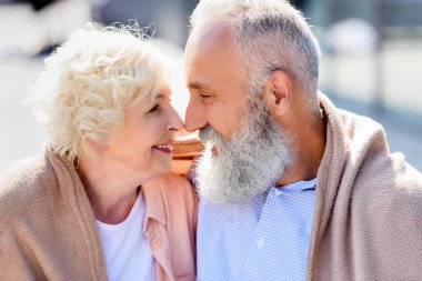 senior couple looking at each other clipart
