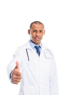 başparmak ile Afrika kökenli Amerikalı doktor