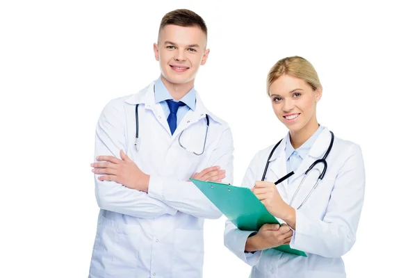 Doctors in white coats with diagnosis — Stock Photo, Image