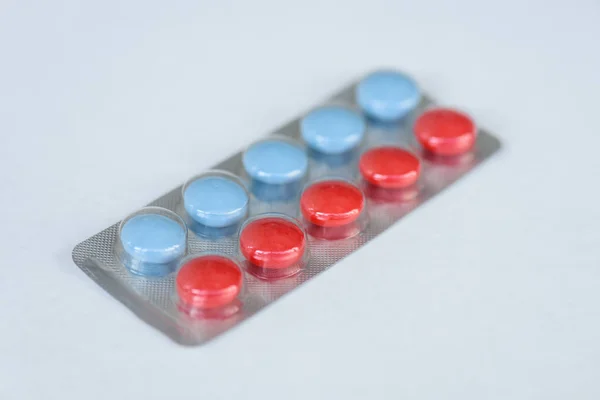 Röda och blå piller — Gratis stockfoto