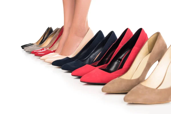 Woman and arranged fashionable shoes — Stock Photo, Image