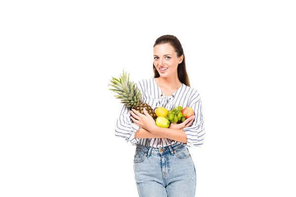 Mujer sosteniendo varias frutas —  Fotos de Stock