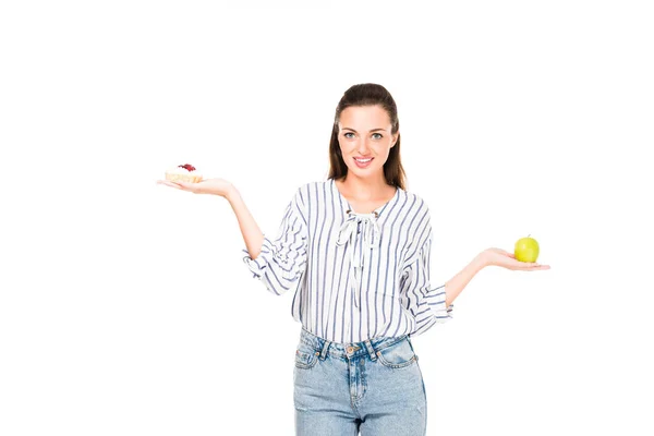 Kvinna med bakelse och äpple — Gratis stockfoto