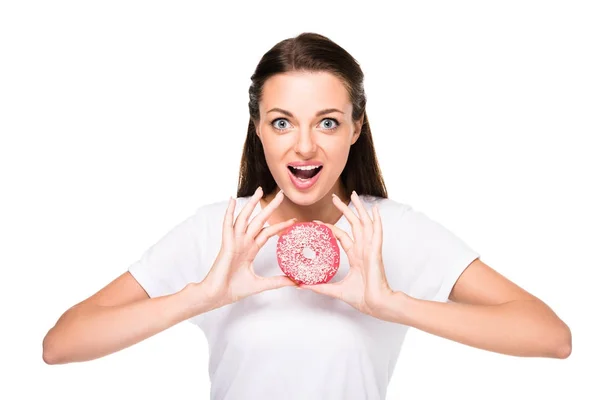 Young woman with doughnut — Free Stock Photo