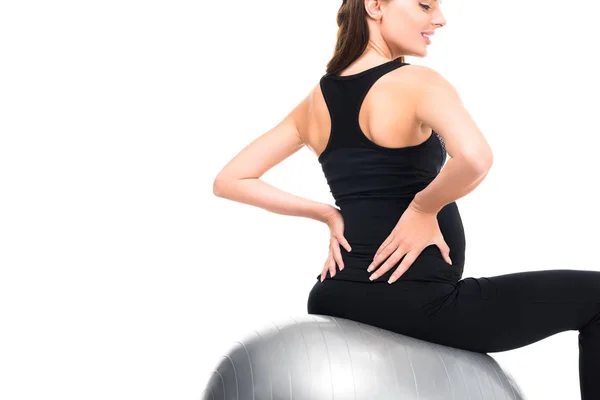 Pregnant woman exercising on fitness ball — Stock Photo, Image