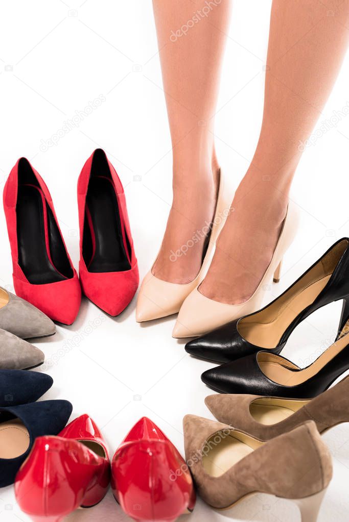 woman standing in circle with shoes