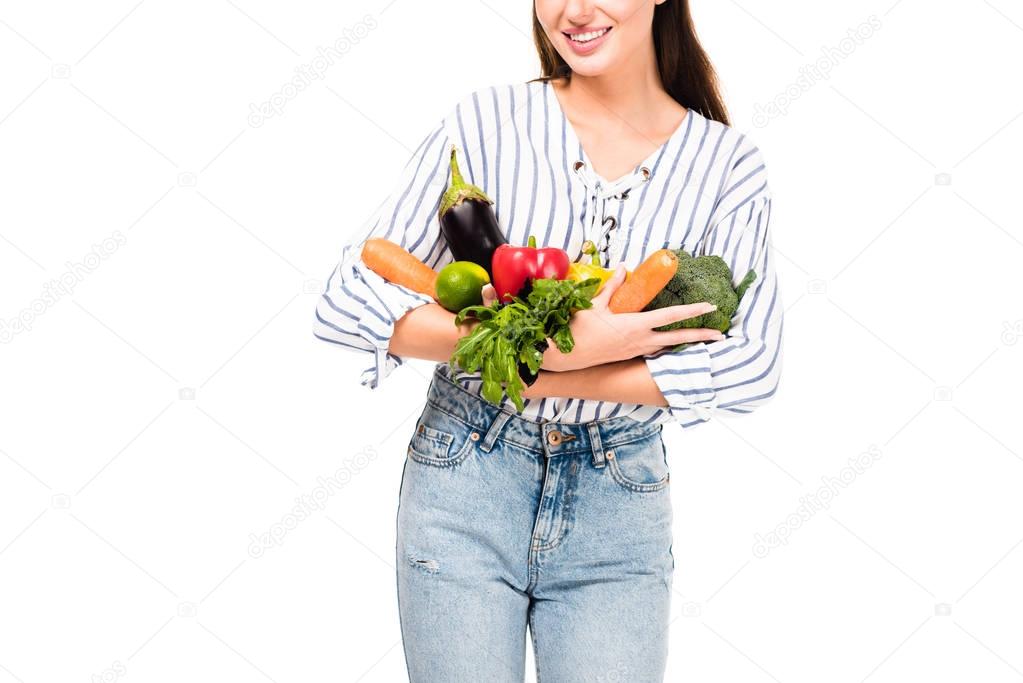 woman with various fresh vegetables