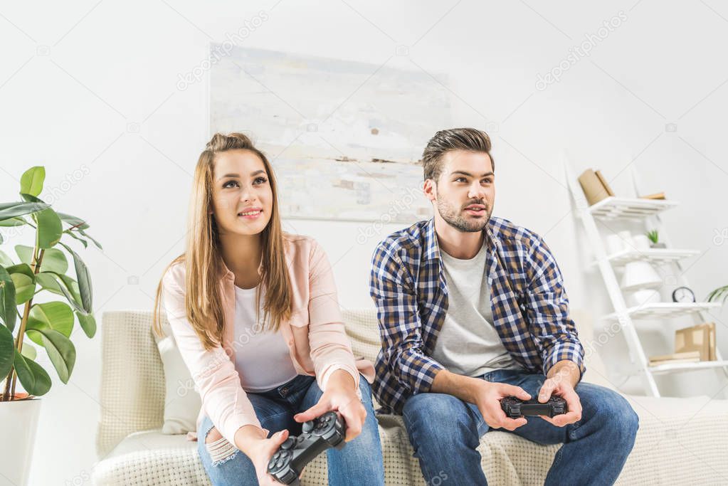 couple playing videogame