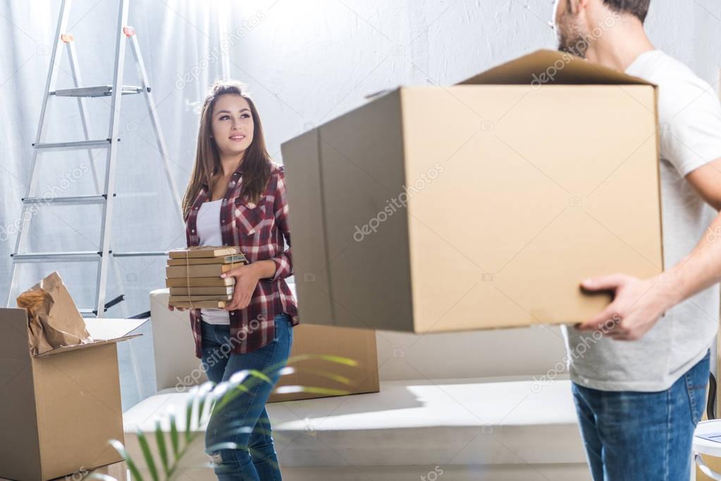 Couple unpacking after moving