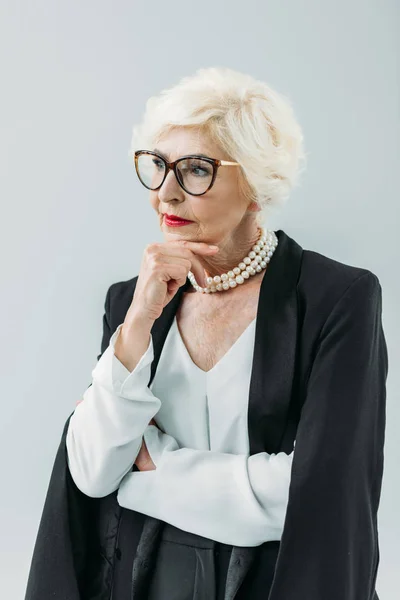 Gondolkodó idősebb hölgy — Stock Fotó