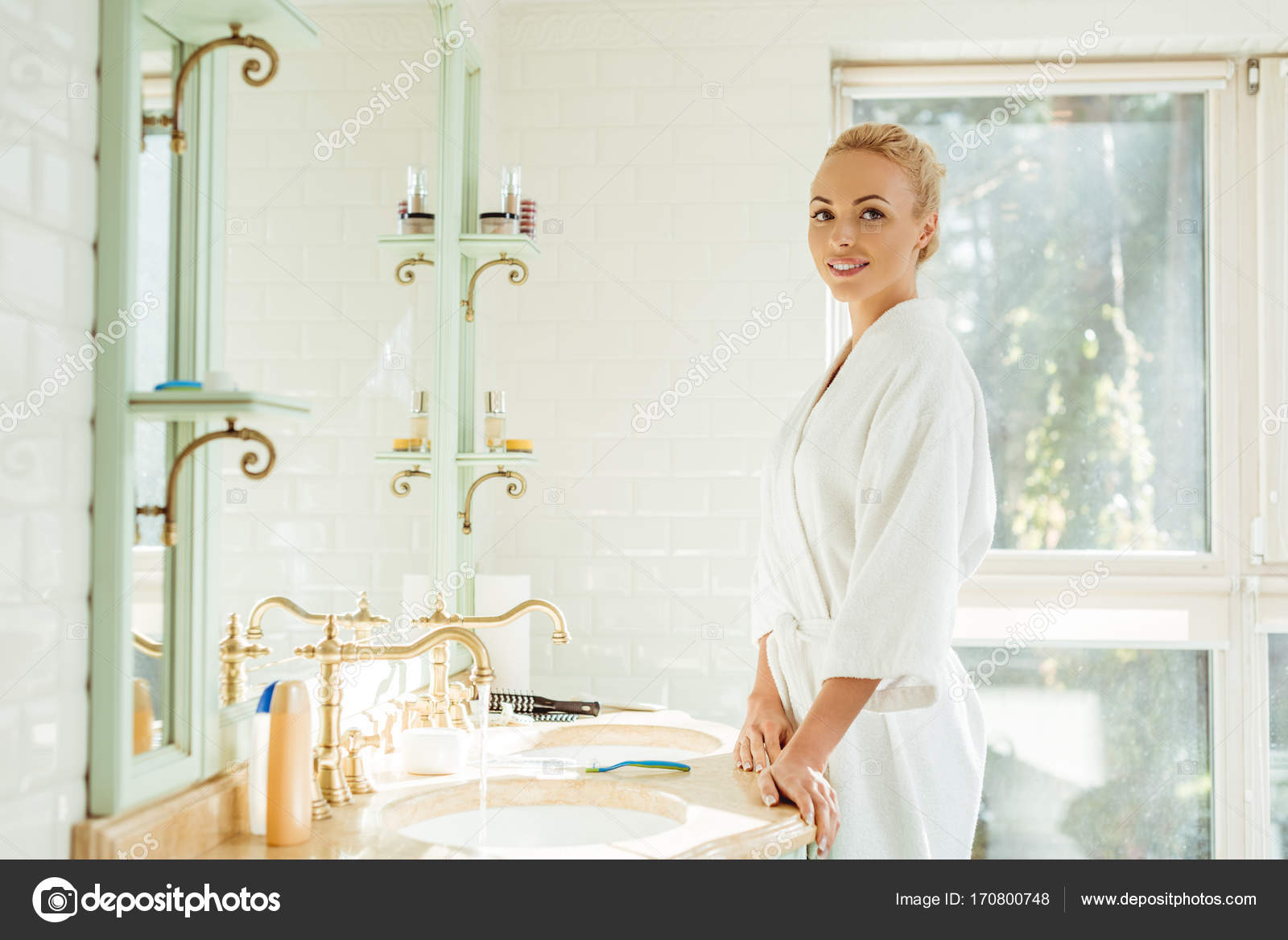 Beautiful woman in bathrobe — Stock Photo © AllaSerebrina 170800748
