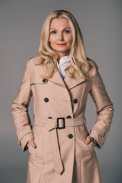mature woman in trench coat