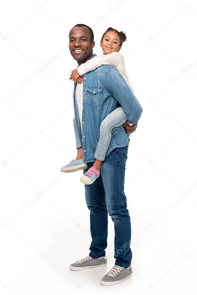 father piggybacking daughter
