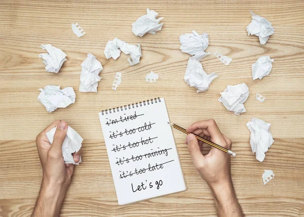 Businessman writing in notepad — Stock Photo, Image