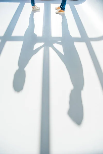 Young couple and shadows — Stock Photo, Image