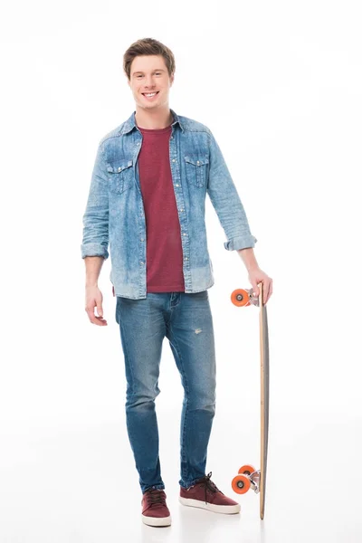 Young man with skateboard — Stock Photo, Image