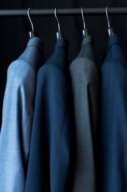 suit jackets in boutique clipart