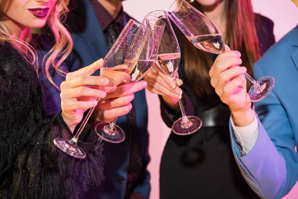 Clinking with champagne glasses — Stock Photo, Image