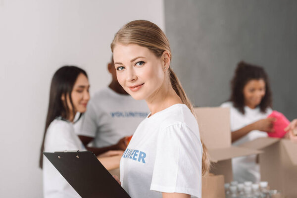 female volunteer with clipboard