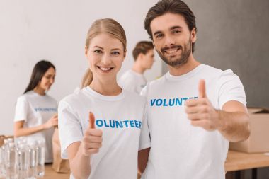 volunteers showing thumb up clipart