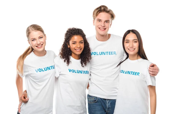 Молодые обнимающие добровольцы — стоковое фото