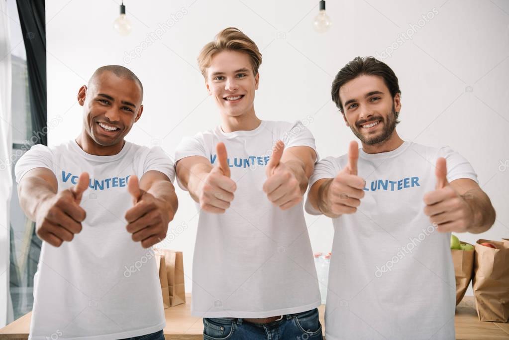 volunteers showing thumbs up