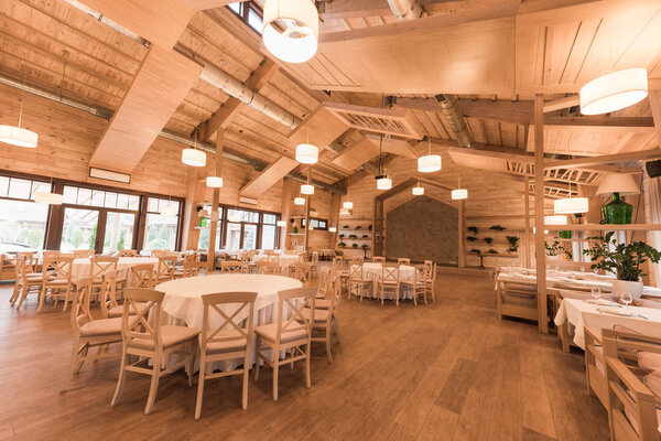 Empty restaurant with wooden interior