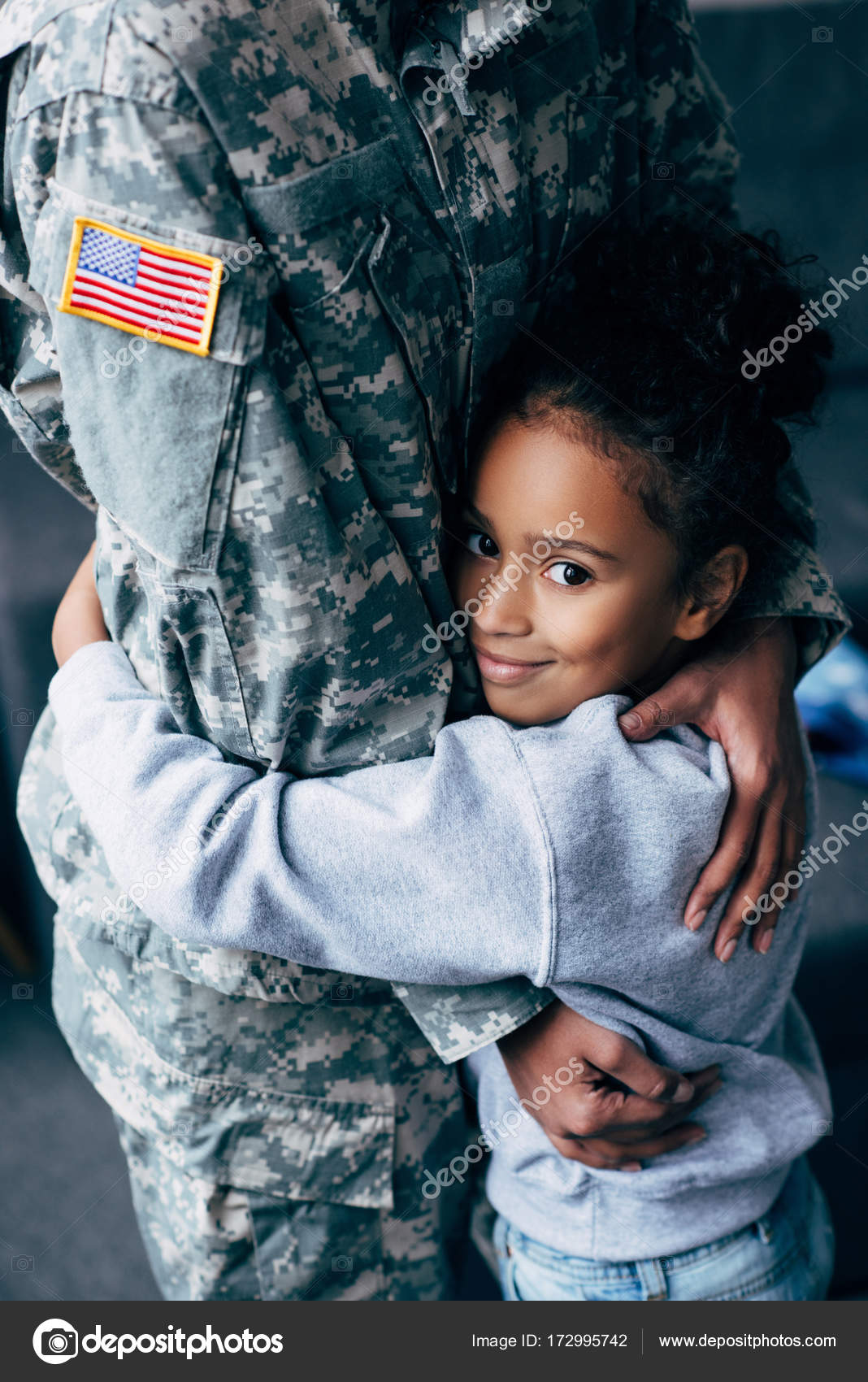 Daughter hugging soldier — Stock Photo © AllaSerebrina 172995742