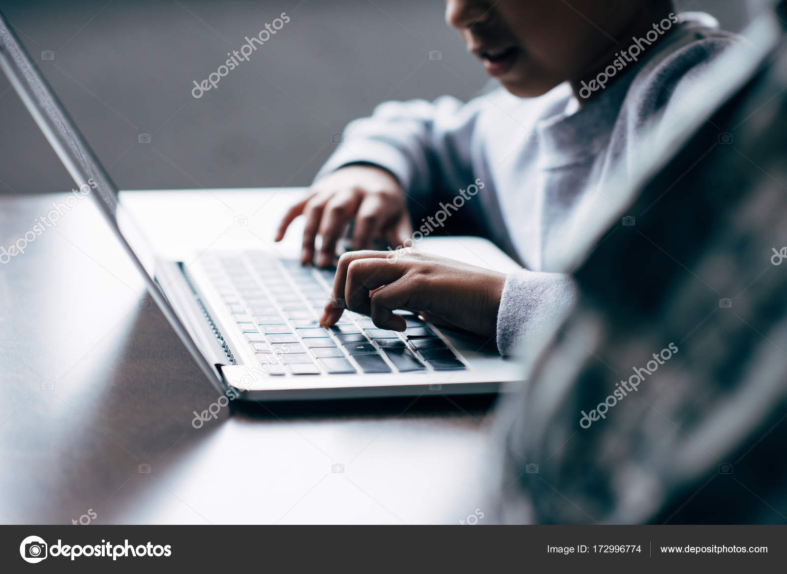 Child typing on laptop — Stock Photo © AllaSerebrina #172996774