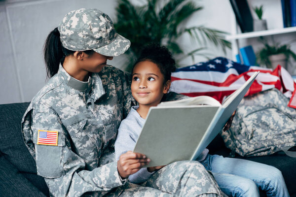 daughter and mother reading book