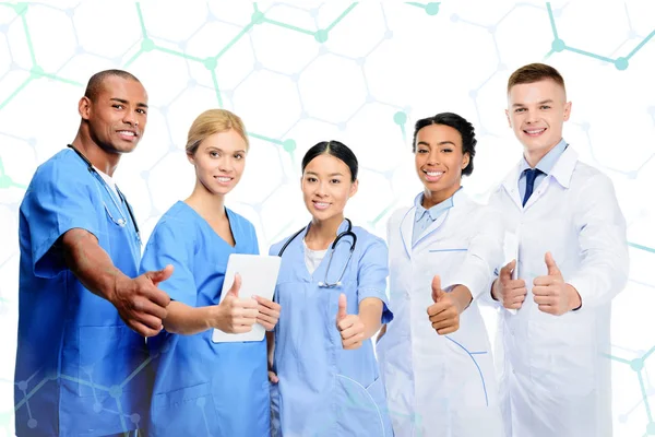 Multiethnic surgeons and doctors — Stock Photo, Image