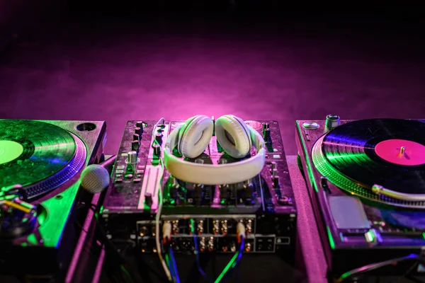 Sound mixer with vinyl and headphones — Stock Photo, Image