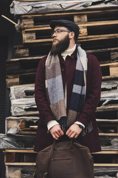 Stylish man with leather bag — Stock Photo, Image