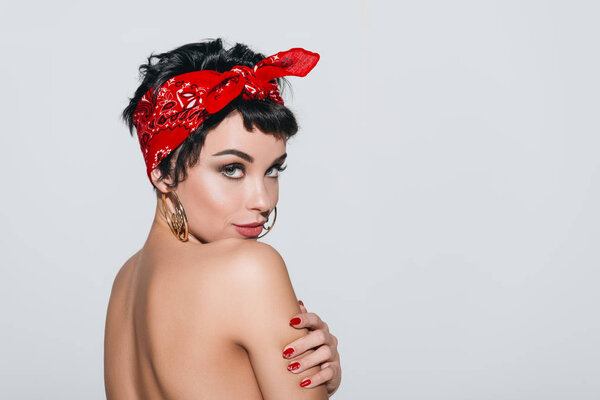 beautiful naked girl in earrings  