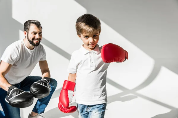 Father and son boxing together — Stock Photo, Image