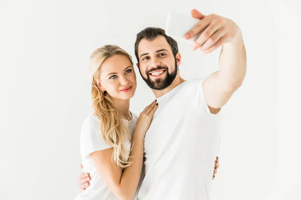 Pár užívající selfie s smartphonem — Stock fotografie