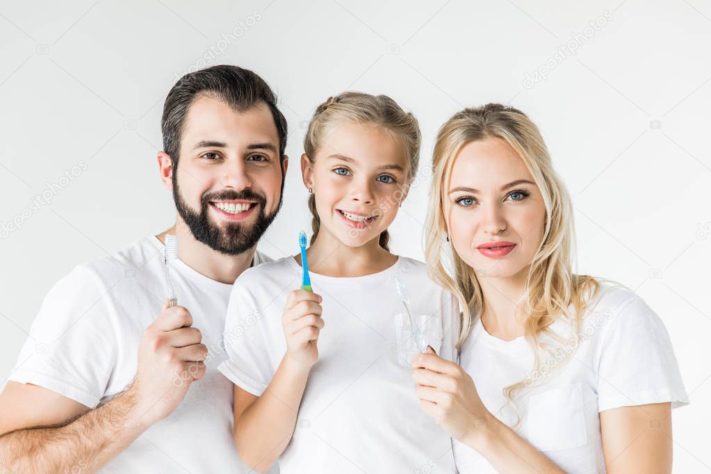 happy family with toothbrushes