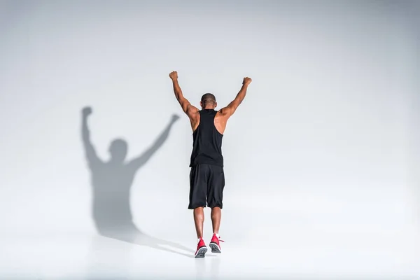 Back View Athletic African American Sportsman Triumphing Raised Hands Grey — Stock Photo, Image