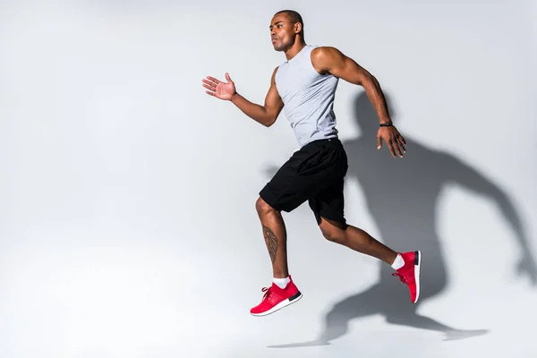 Athletic Young African American Sportsman Running Grey — Stock Photo, Image