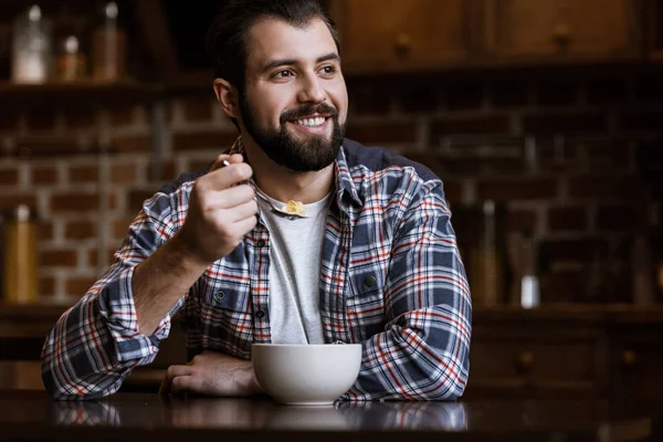 Smiling Man Eating Snacks Milk Kitchen — Stock Photo, Image