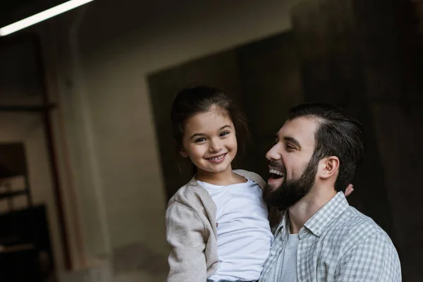 Cheerful Father Daughter Hugging Looking Camera Home — Stock Photo, Image