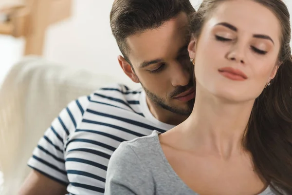 Passionate Young Man Kissing Neck Girlfriend — Stock Photo, Image