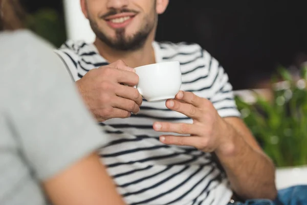 Cropped Shot Smiling Young Man Drinking Coffee Date Girlfriend — Free Stock Photo