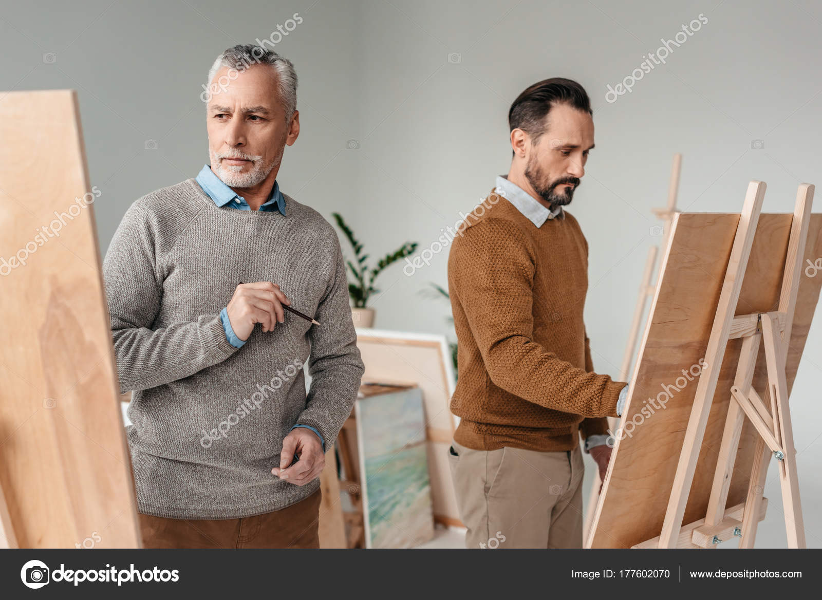 Two Adult Male Artists Painting Easels Art Studio Stock Photo by  ©AllaSerebrina 177602070